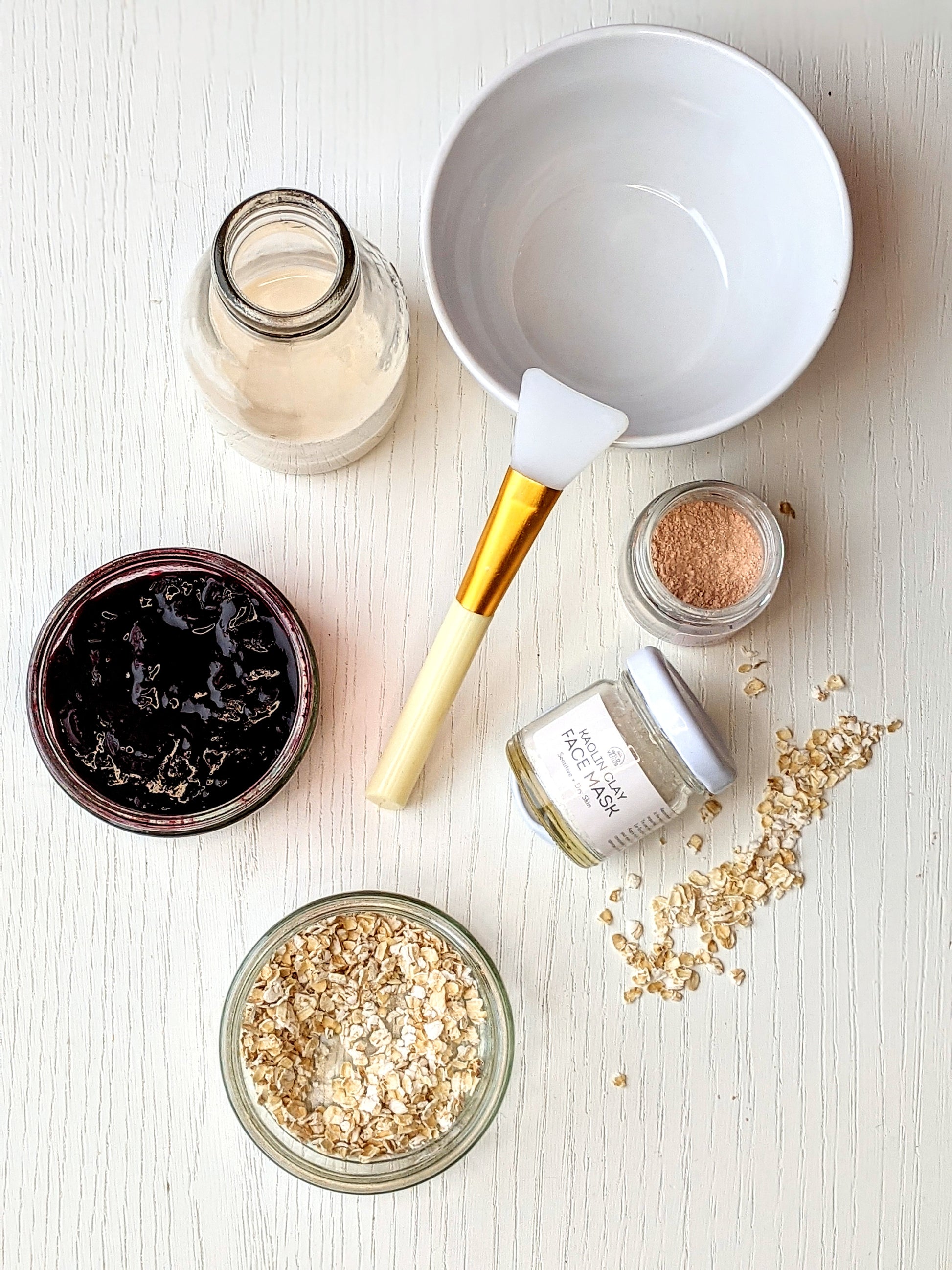 A table is set up ready to make a blueberry and oat face mask. 