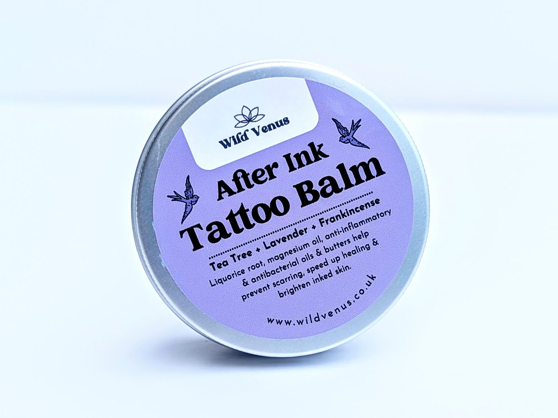 A photo of the After Ink tattoo Balm in focus against a white background. 